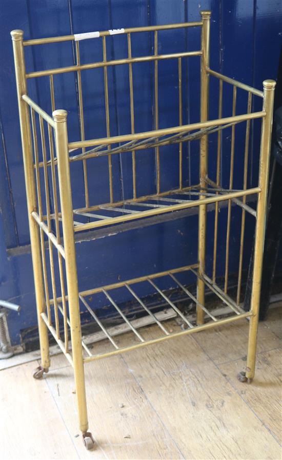 An Edwardian brass newspaper rack, H.79cm